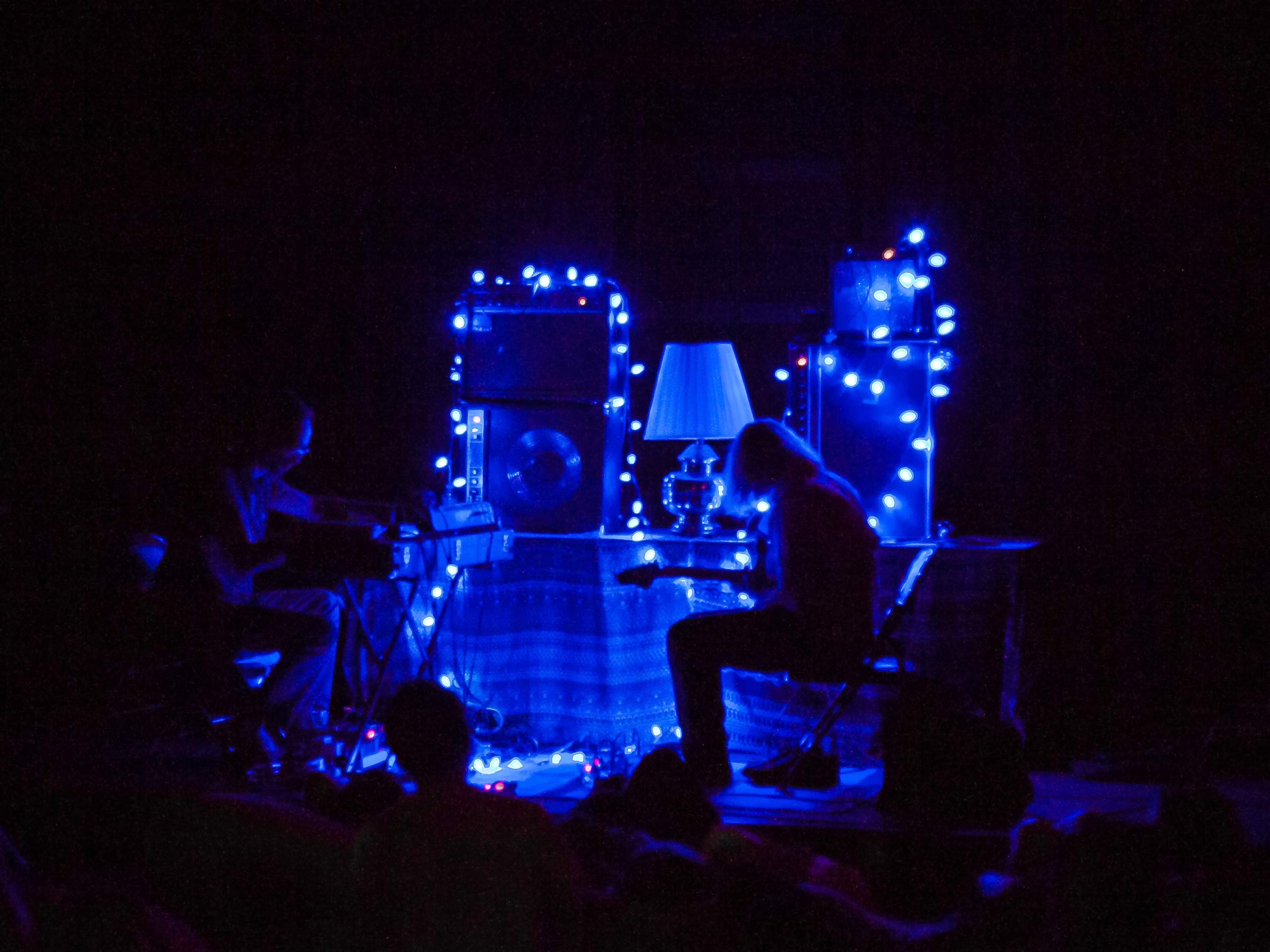 Peals performing at Artisphere, surrounded by Blue Lights