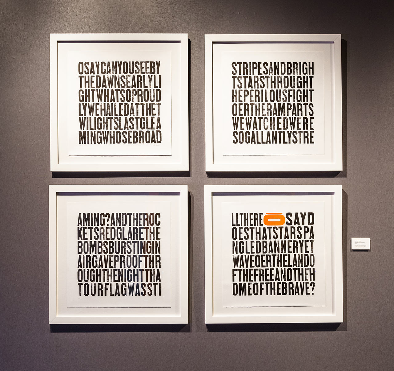 OSAYCANYOUSEE. Set of four framed letterpress prints. Wood type print of the Star Spangled Banner lyrics with all of the letters run together into seamless pattern that rearranges the original words and meanings